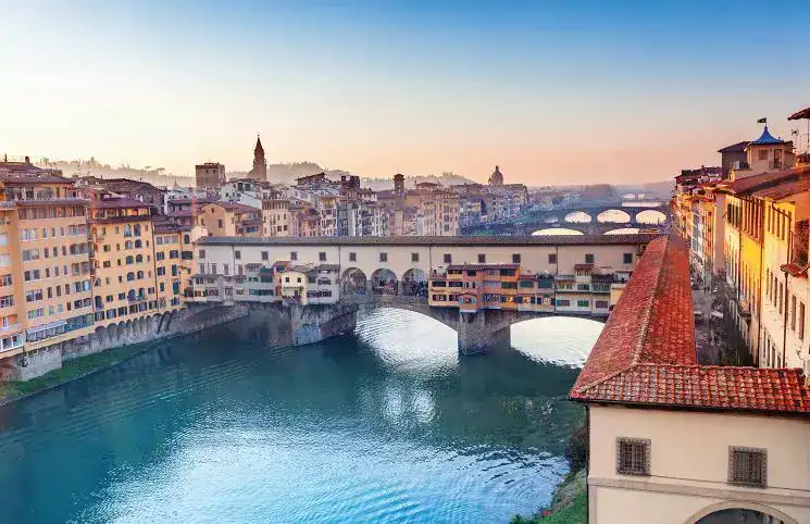 Ponte Vecchio over the Arno at sunset, Florence, Italy